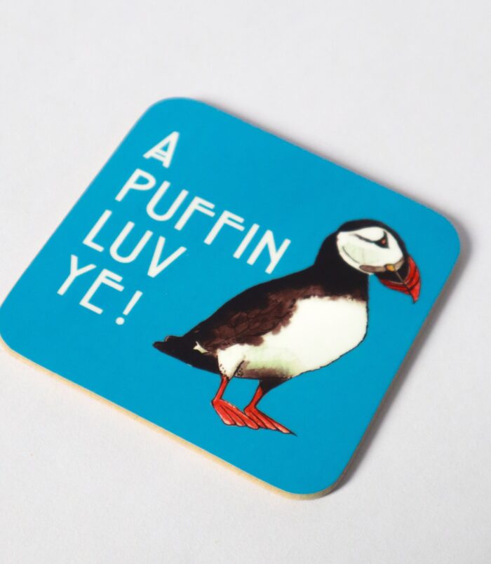 Handprinted Scottish coaster featuring a colourful puffin design, perfect for adding a wee bit of Scottish flair to your table. Illustrated and designed by Aff Yer Rocket.