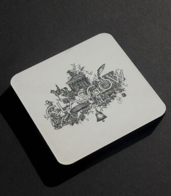 A handprinted Scottish coaster featuring famous landmarks and icons from around the city of Glasgow, illustrated in pencil. The design surrounds the word 'Glasgow' in the centre to create an intricate design. The perfect Glasgow gift for a friend or to add some Scottish flair to your table. Illustrated and designed by Aff Yer Rocket.