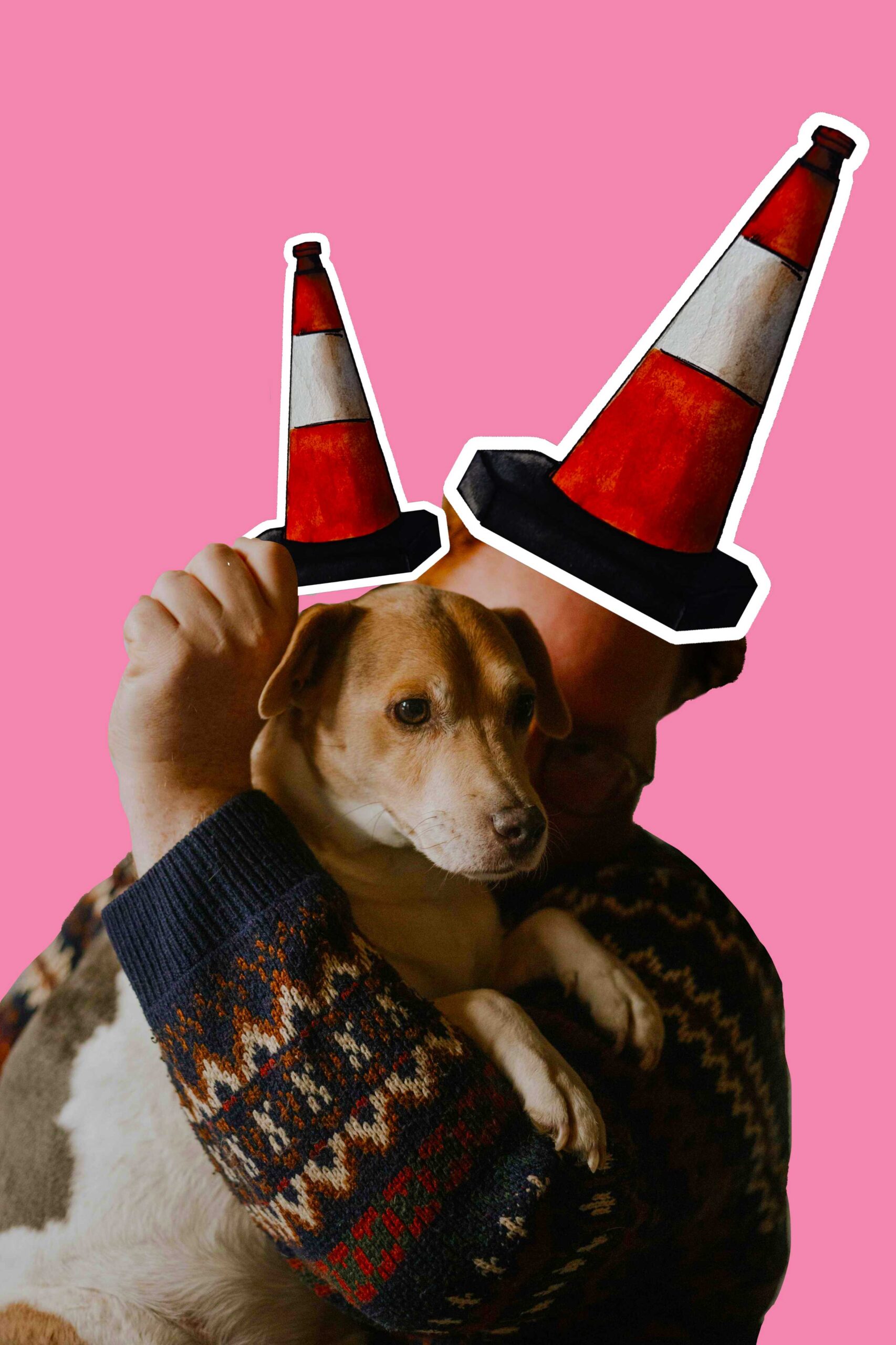 This photo shows a ginger man holding a Jack Russell dog in his arms. In one hand above the dogs head he has a traffic cone over the dogs head to mimic the iconic Glasgow Duke Cone Head Hat. The man is also wearing wearing a traffic cone hat. Aff Yer Rocket Scottish Gifts.